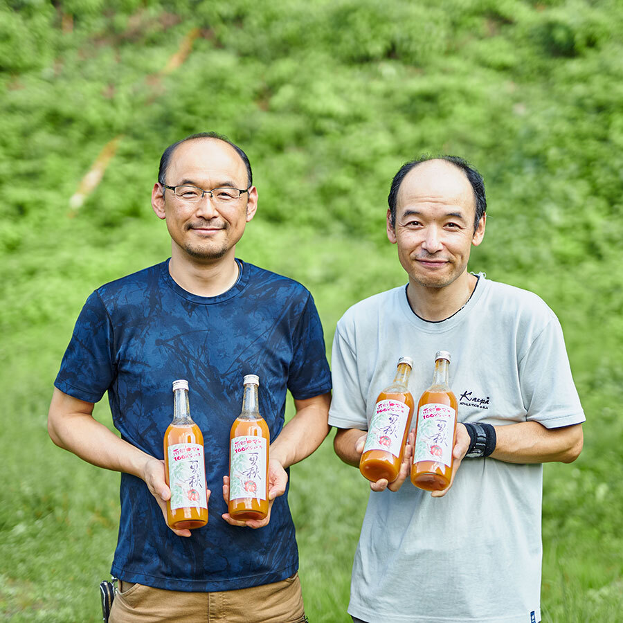 南郷トマトのおいしさを広く伝えることに情熱を注ぐ近藤一夫さんと近藤宏明さん。
