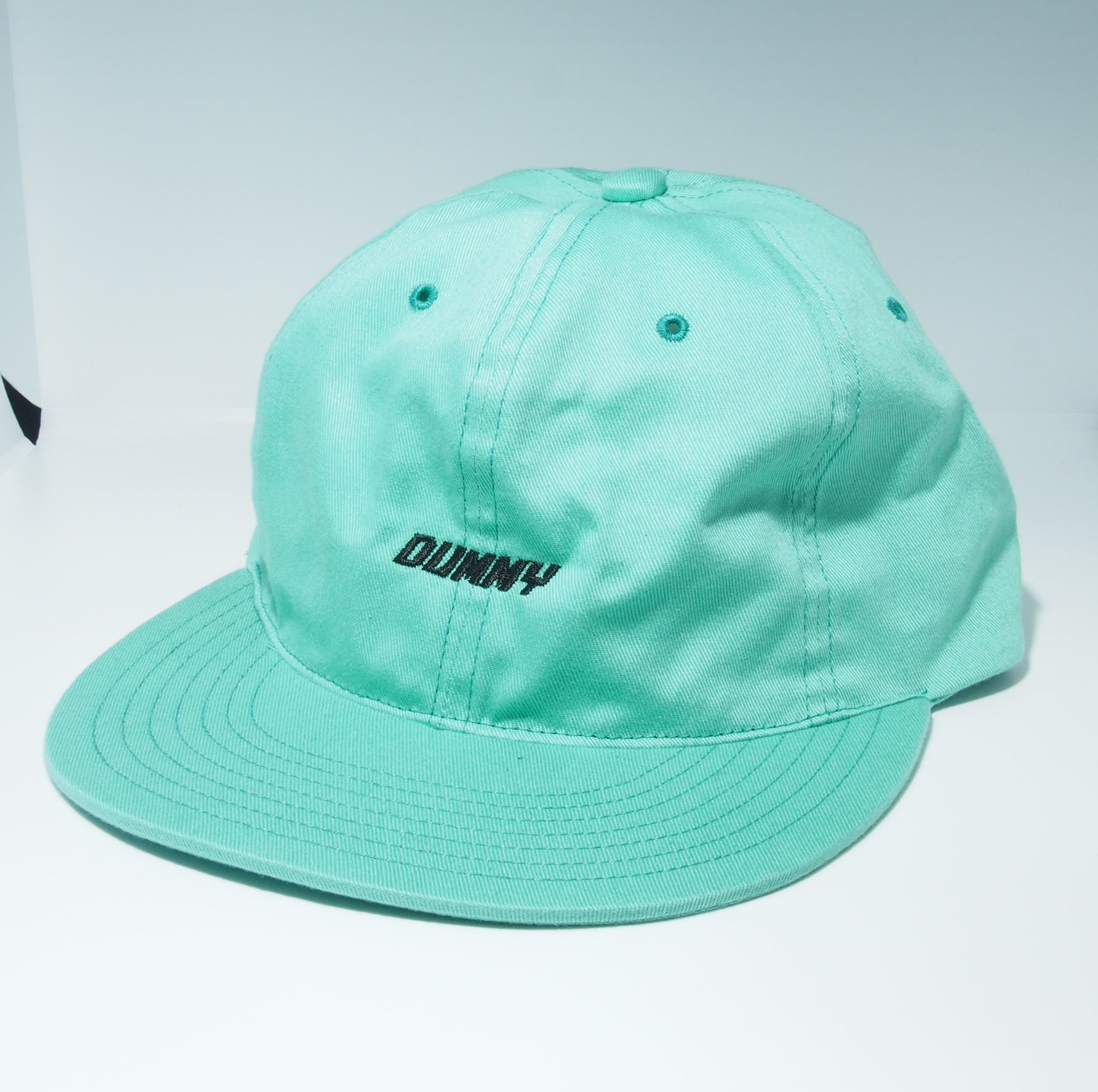 mint green cap