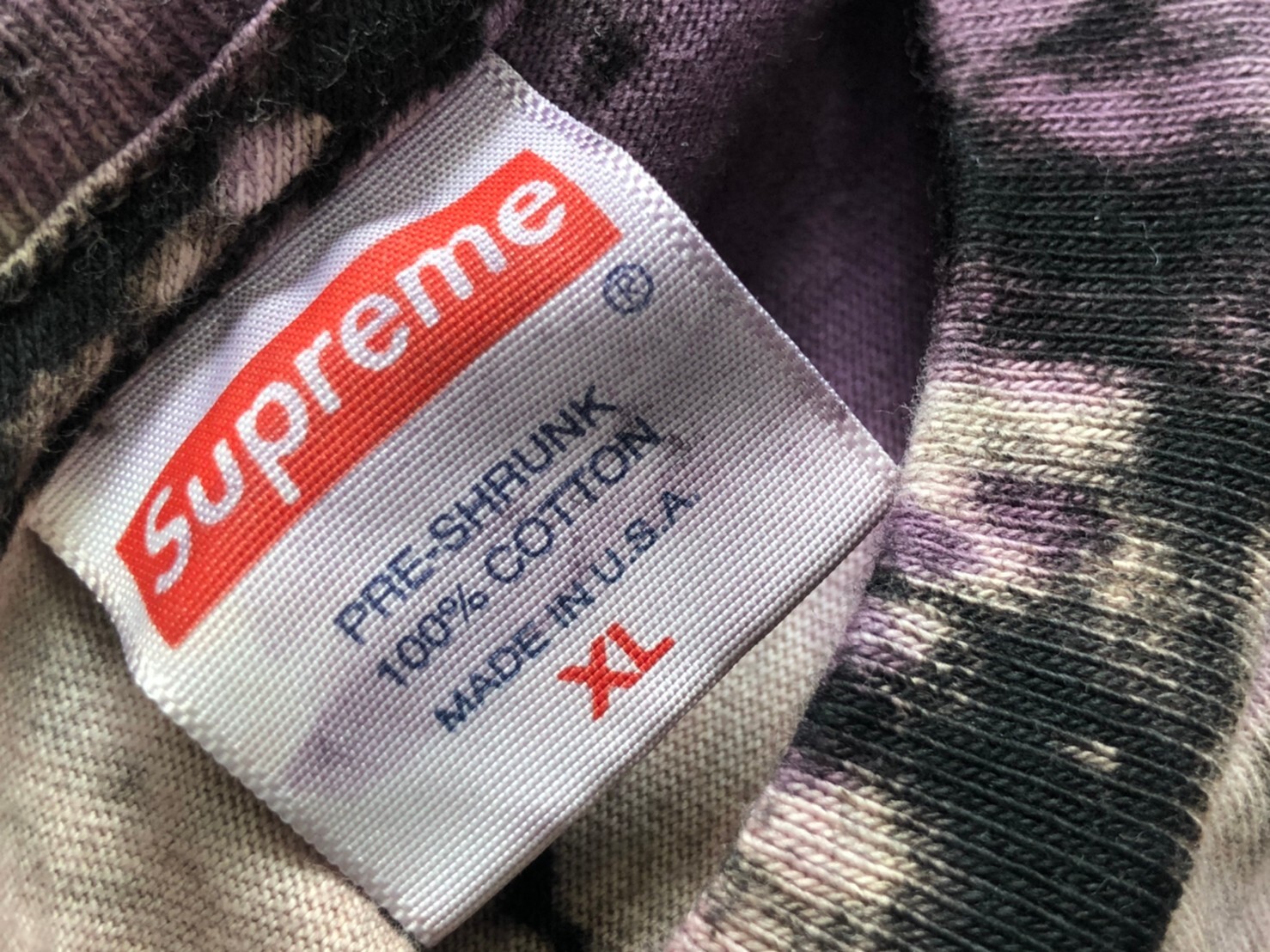 black and purple supreme shirt