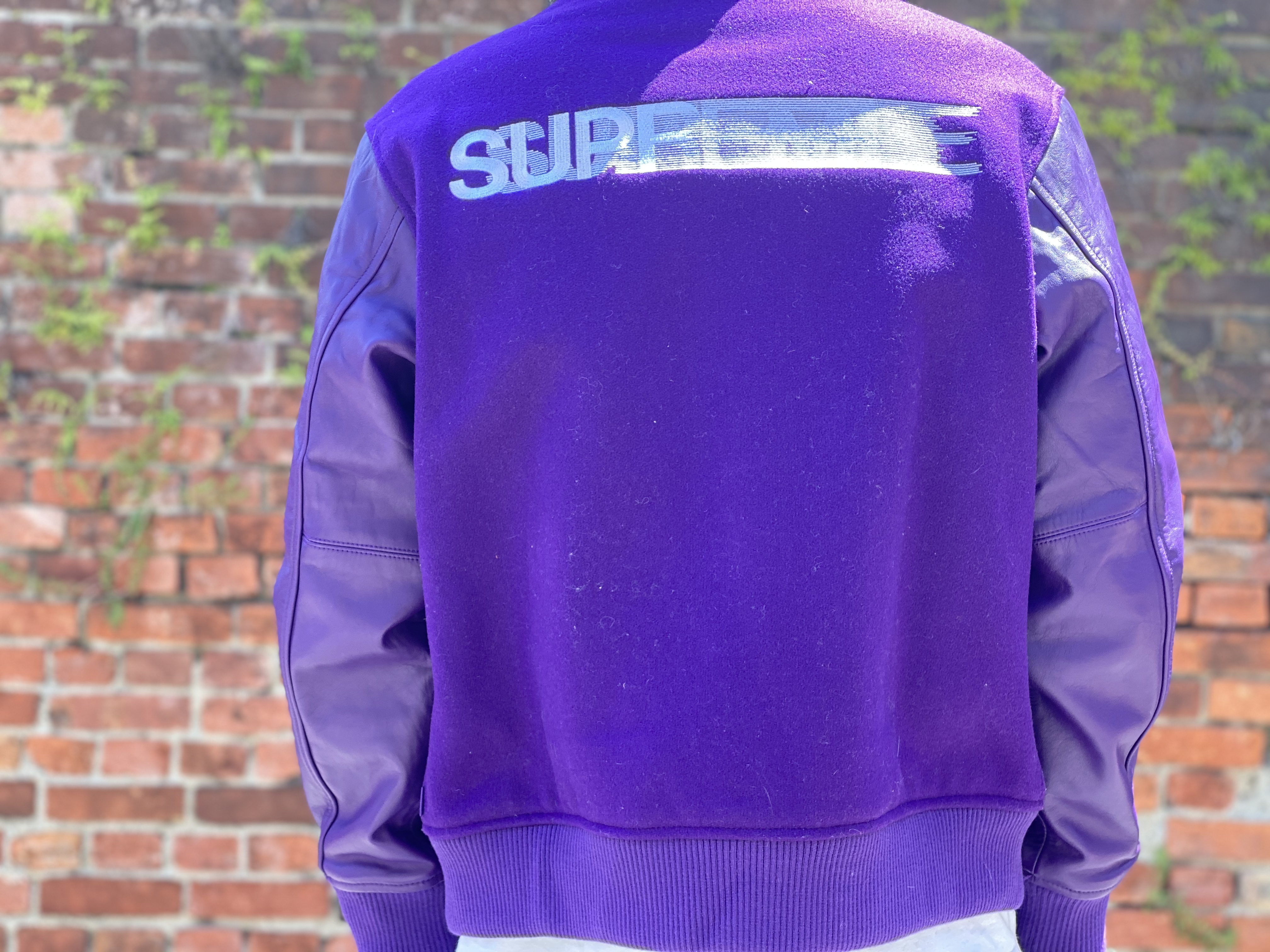 purple supreme sweater