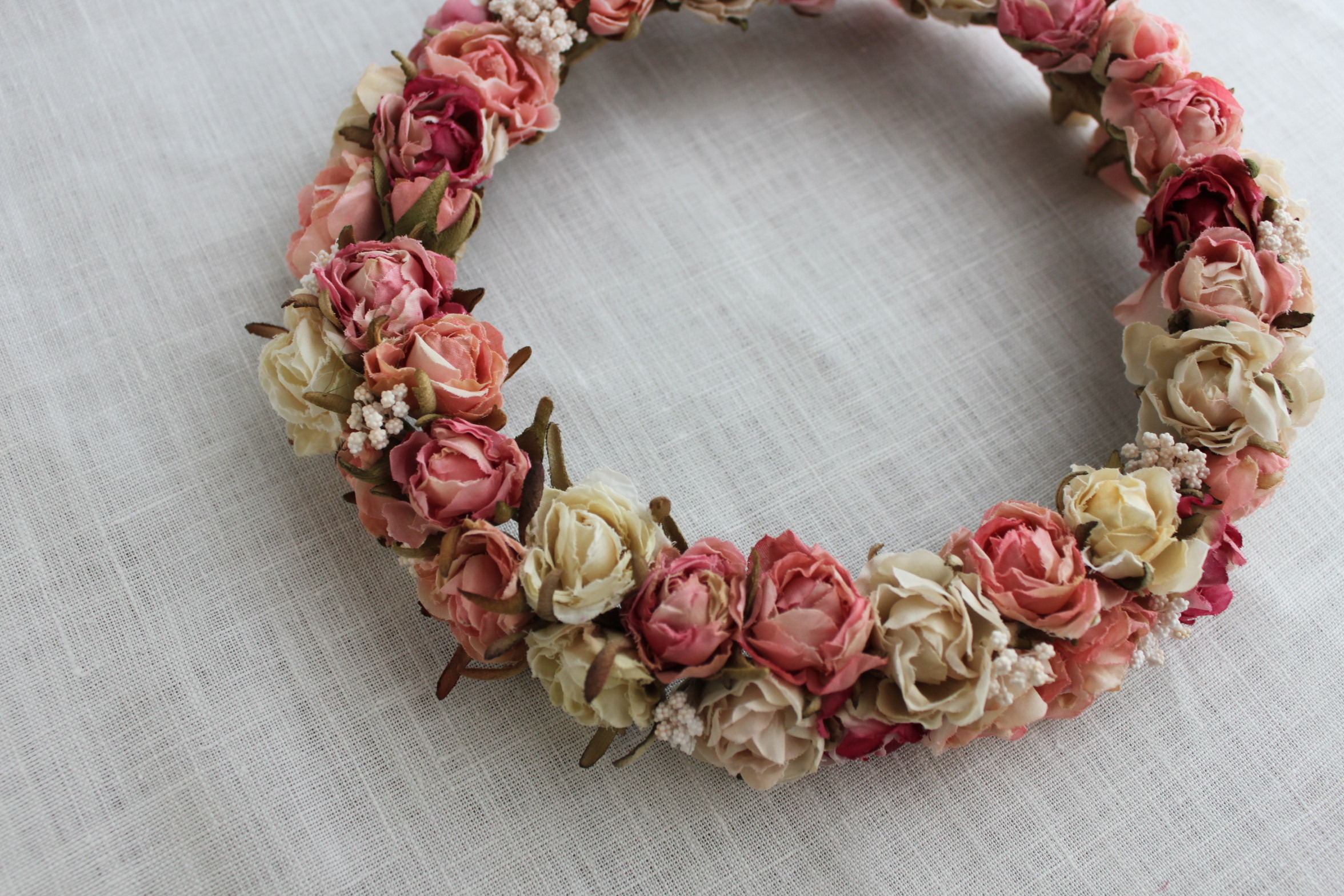 ピンク色の薔薇リース Marumero Mashulo