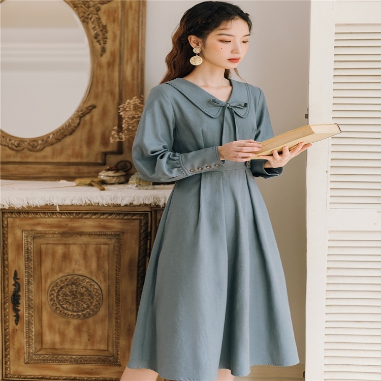 秋冬ワンピース 秋冬ワンピ ワンピース ワンピ レディース 女性用 通販ワンピース 通販ワンピ 長袖 ひざ丈 リボン ハイウエスト ボタン 立て襟 フレア ふりふり Aライン デート 通勤 通学 オフィス 普段着 デイリー 旅行 人気 おすすめ 定番 シンプル 秋冬 脚長効果 無地