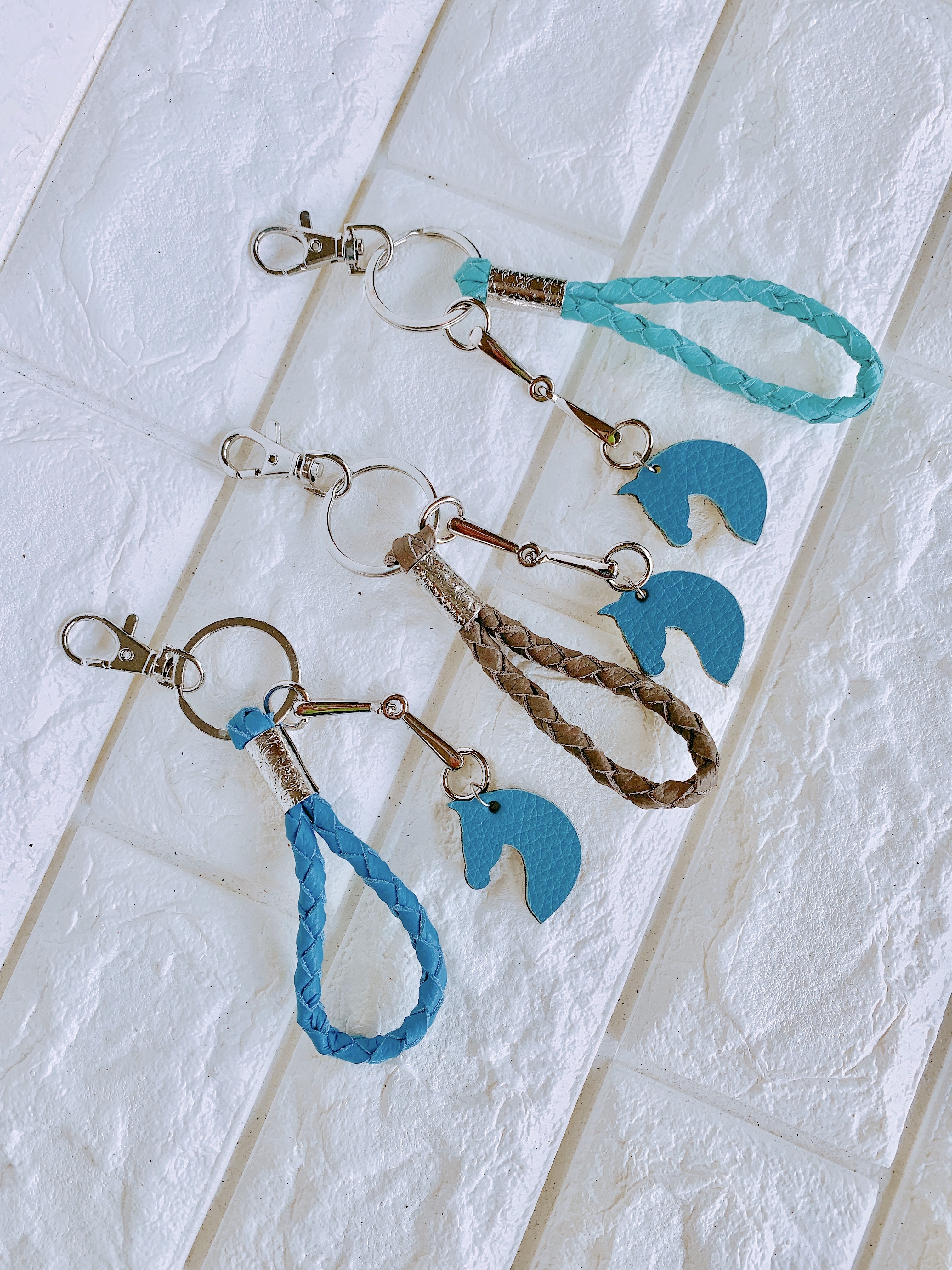 四つ編みレザーキーリング Dressage Ribbon