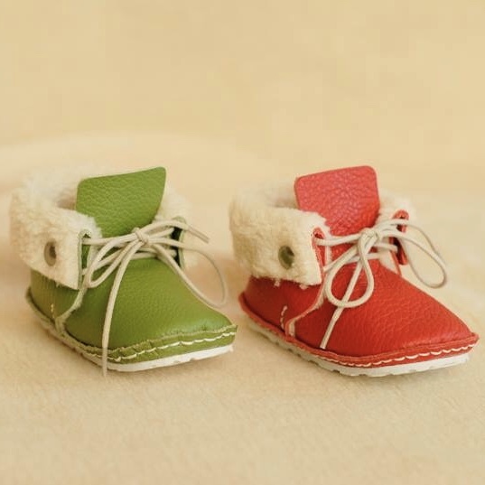 green baby shoes
