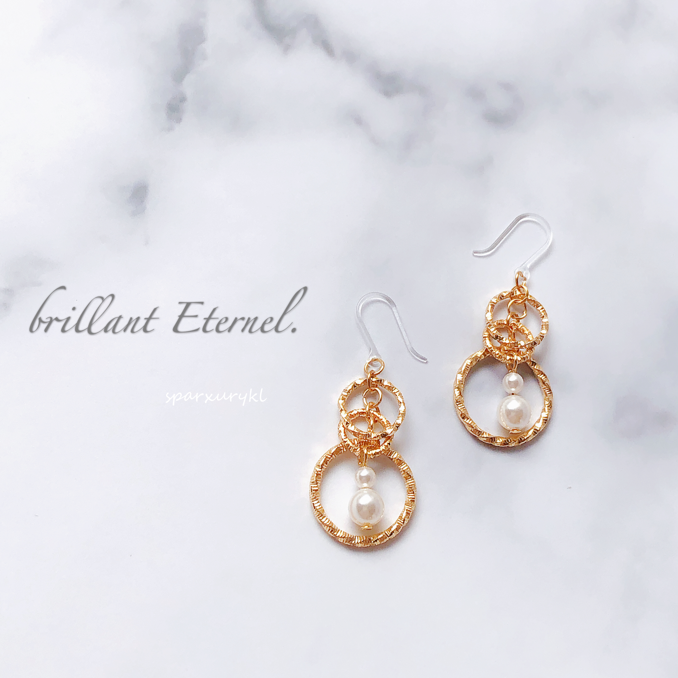 Brillant Eternel ゴールドリング スワロビーズ ピアス Sparxurykl