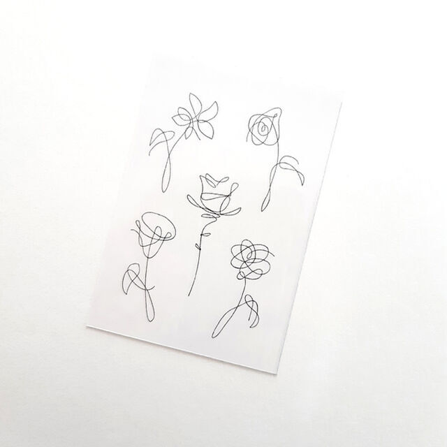 くるくるっとかわいいラインで花の線画のタトゥーシール ハーフサイズ Acubi Drops