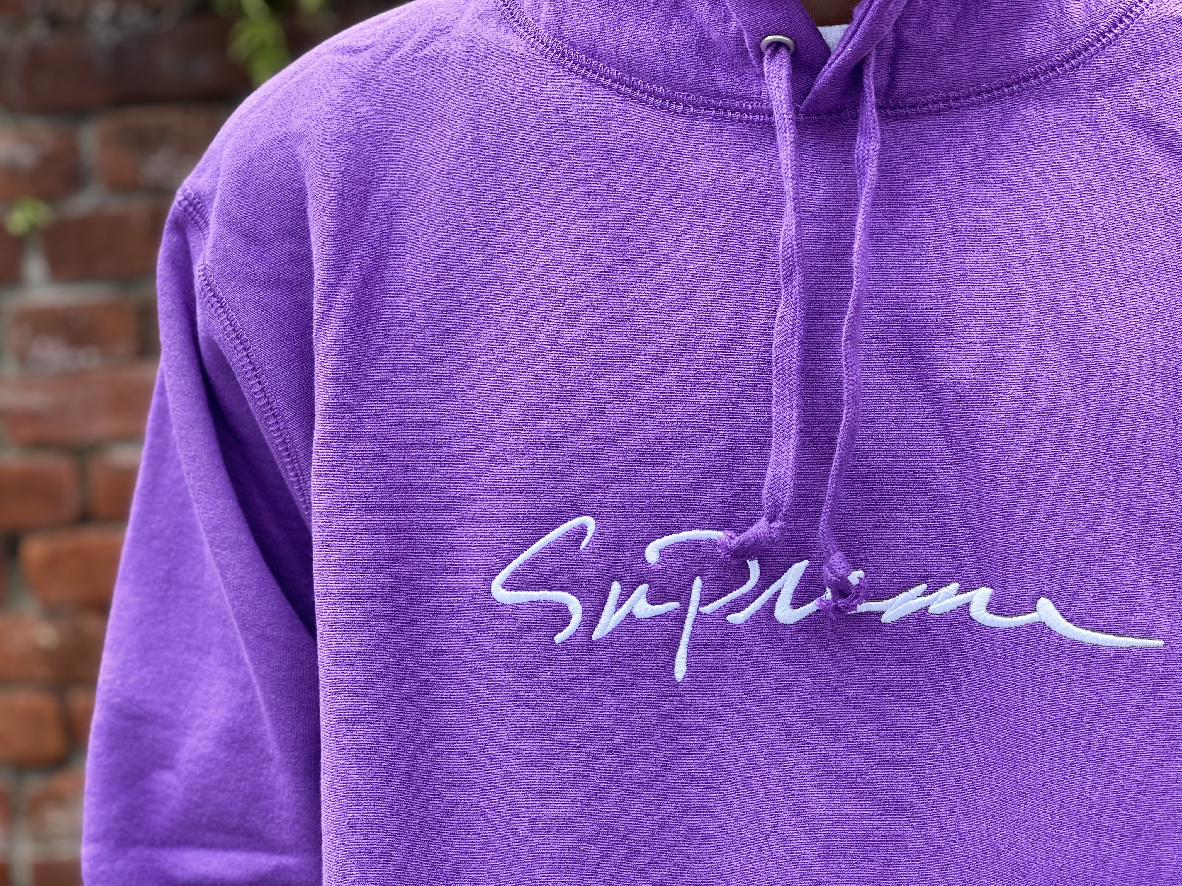 purple supreme sweater