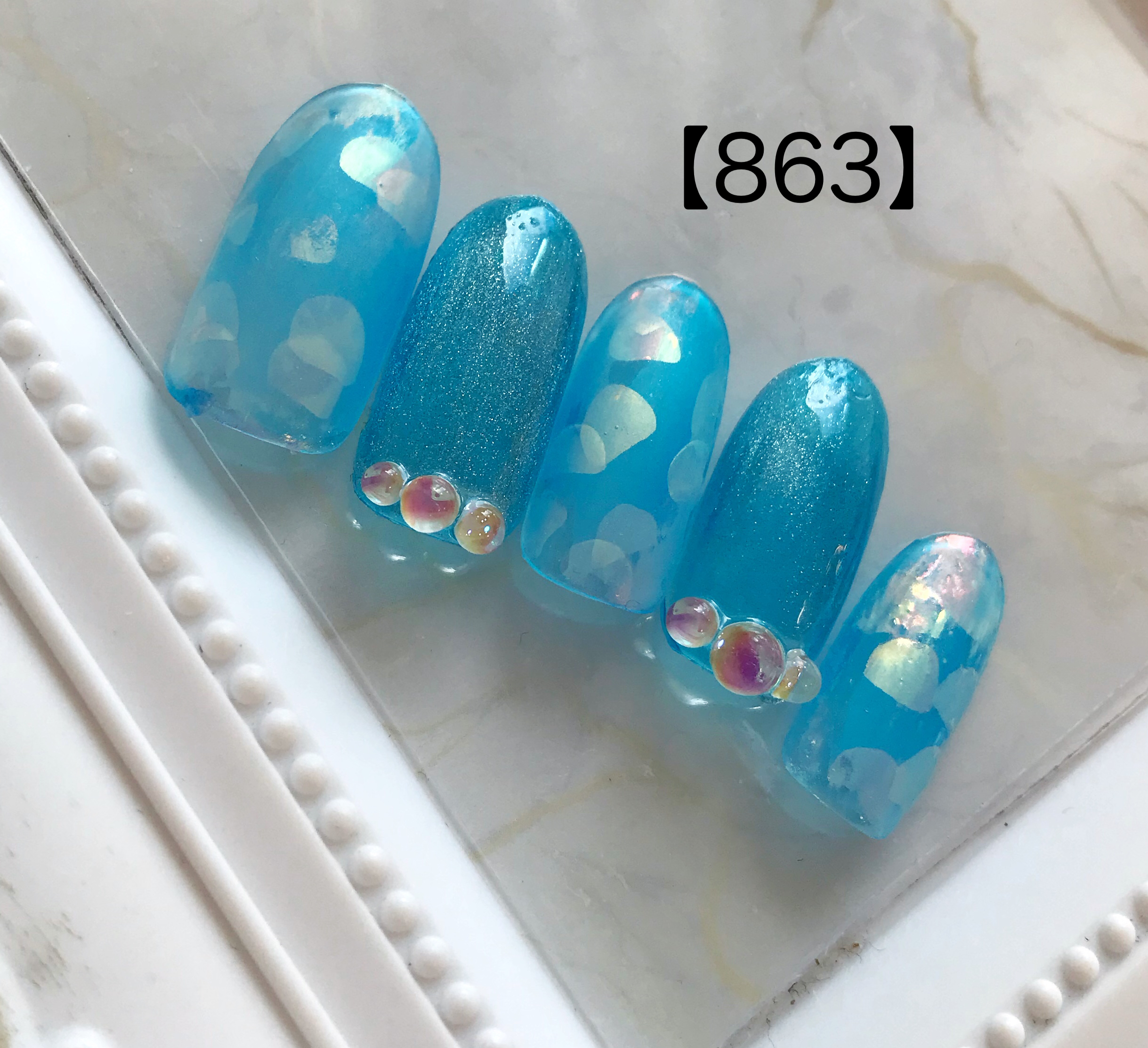 水色プリズムネイル