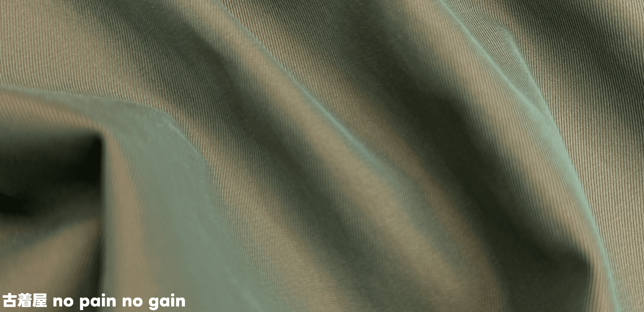 玉虫色（グリーン×オレンジ）のコートとは？生地の特徴と着こなしを解説