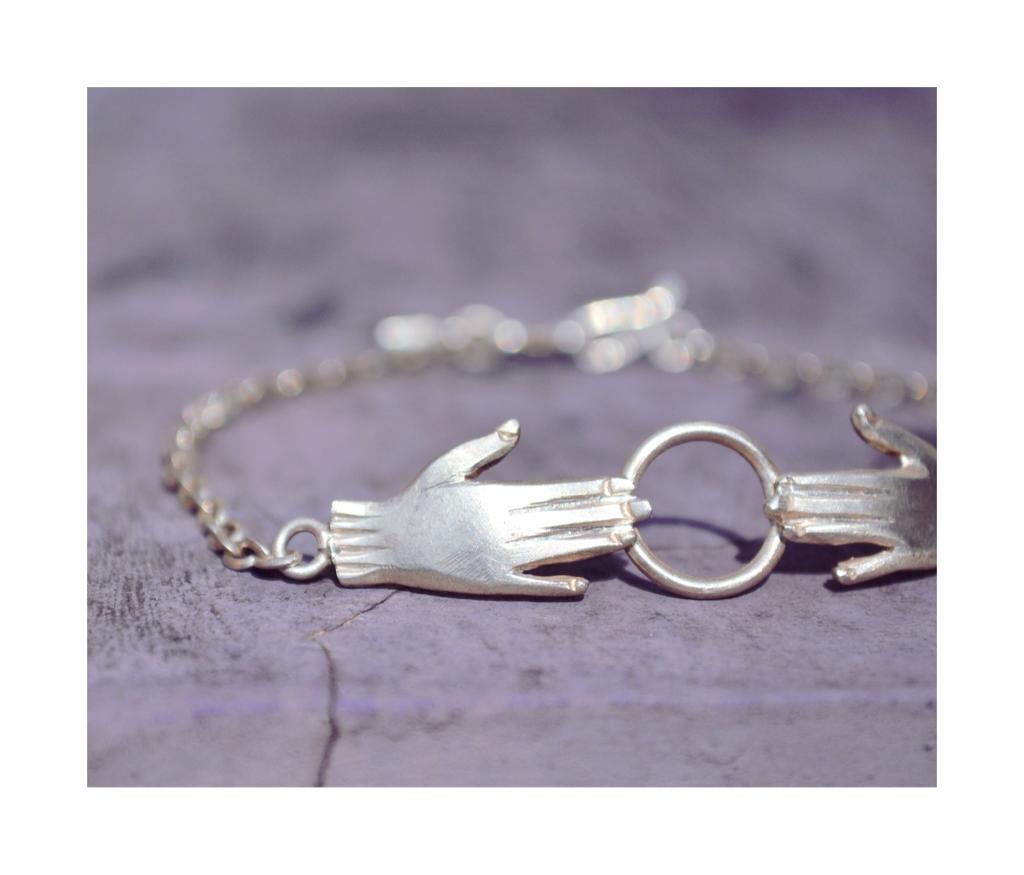Hands and Circle Bracelet