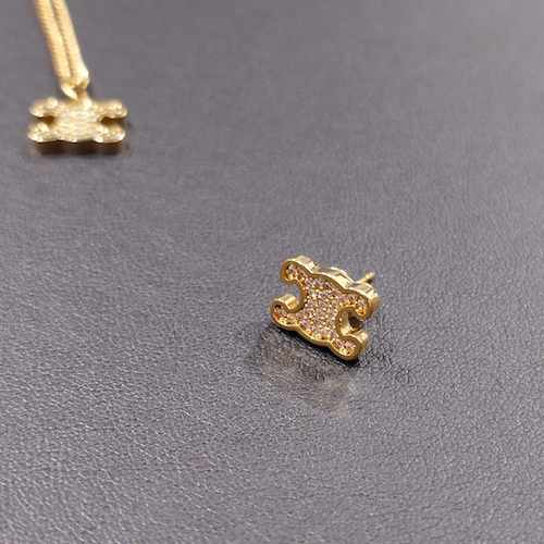 片側のみ CELINE セリーヌ ピアス トリオンフ ラインストーン スタッズ ゴールド.