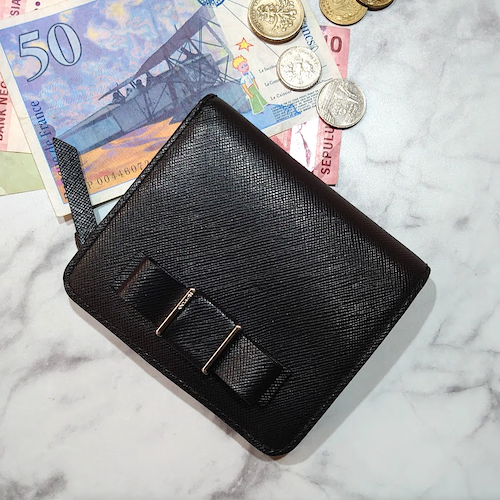 【COACH】 コーチ リボンモチーフ 二つ折りジッピーウォレット.