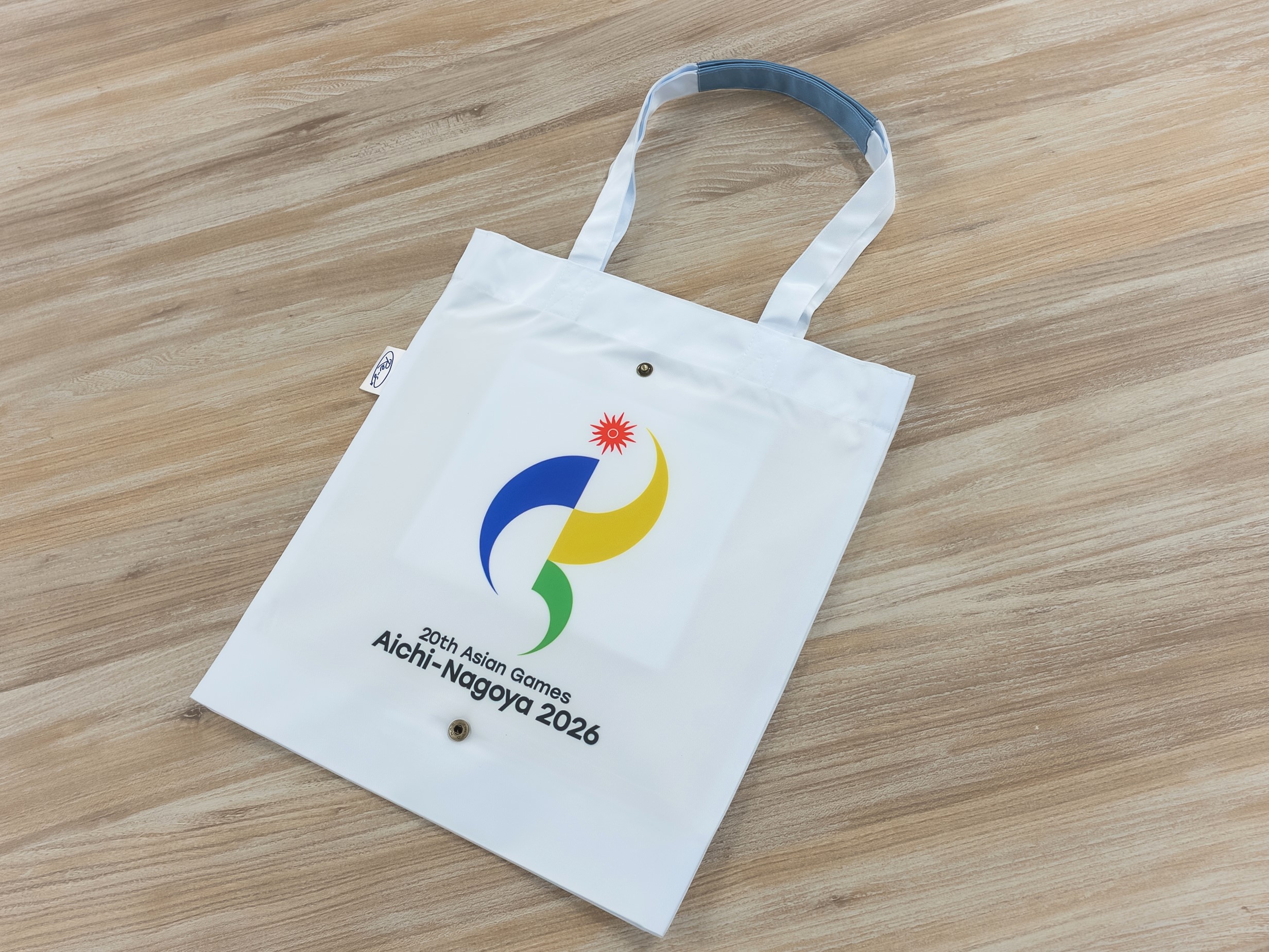 アジア競技大会の公式ライセンスグッズを販売 26年9月