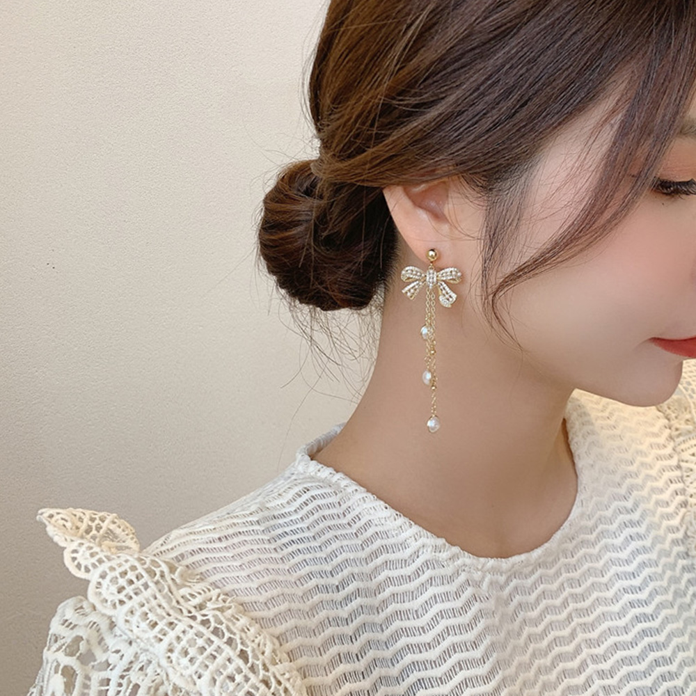 揺れ感たっぷり♪パールが輝くリボンデザインのピアス！