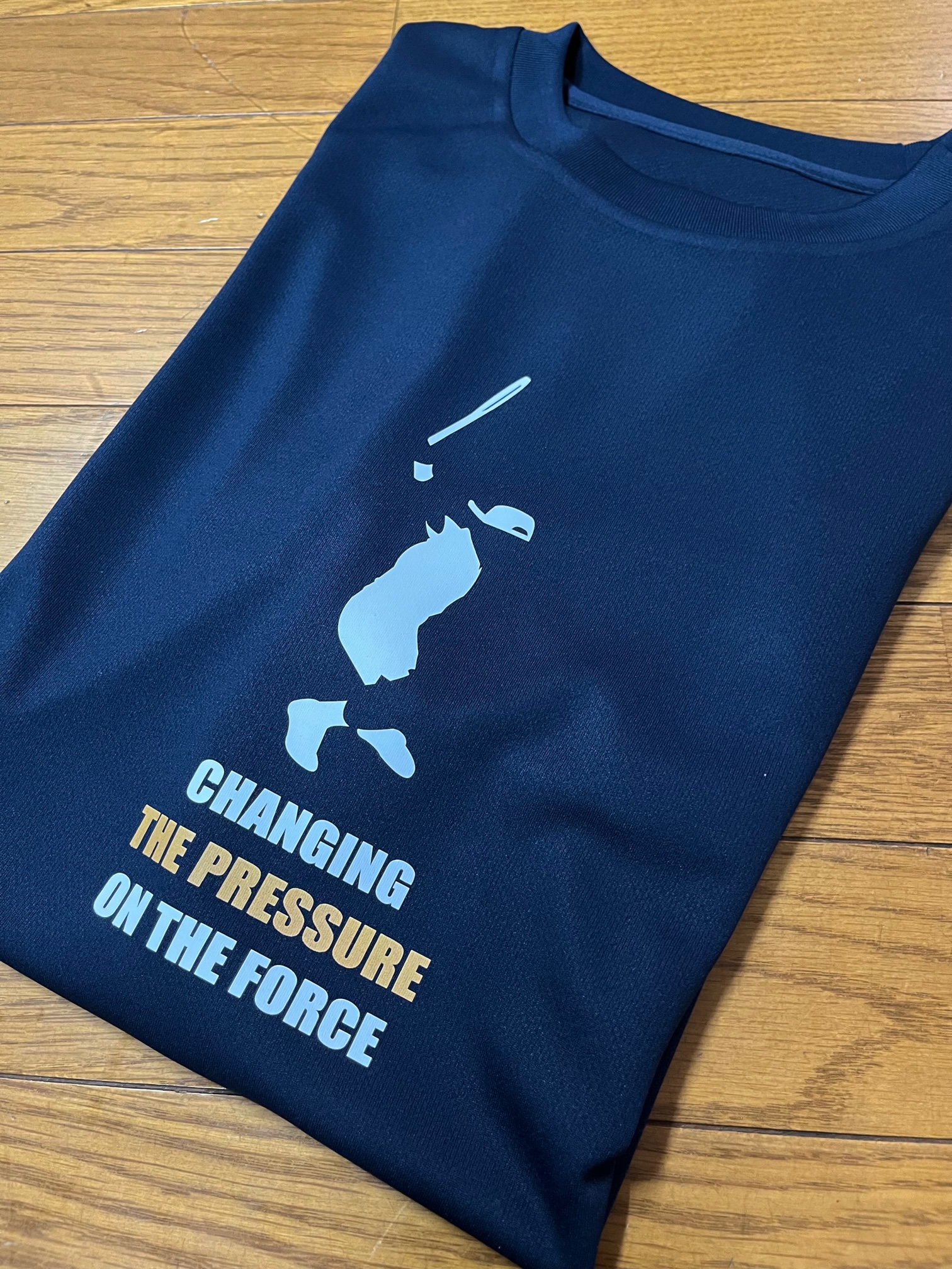 プレッシャーを力に変える　Ｔシャツ　です。