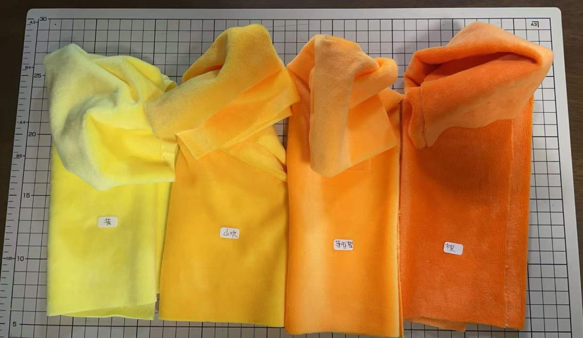 定番生地「リトルボア(ソフトボア)」の黄・山吹・薄明橙・橙を並べてみました。