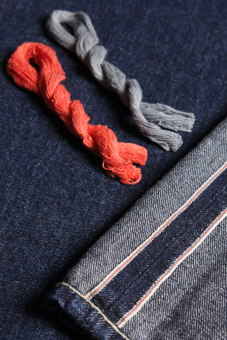 「サーモンピンクの糸を織り込んだ、セルヴィッジデニム」Selvage 10oz Denim
