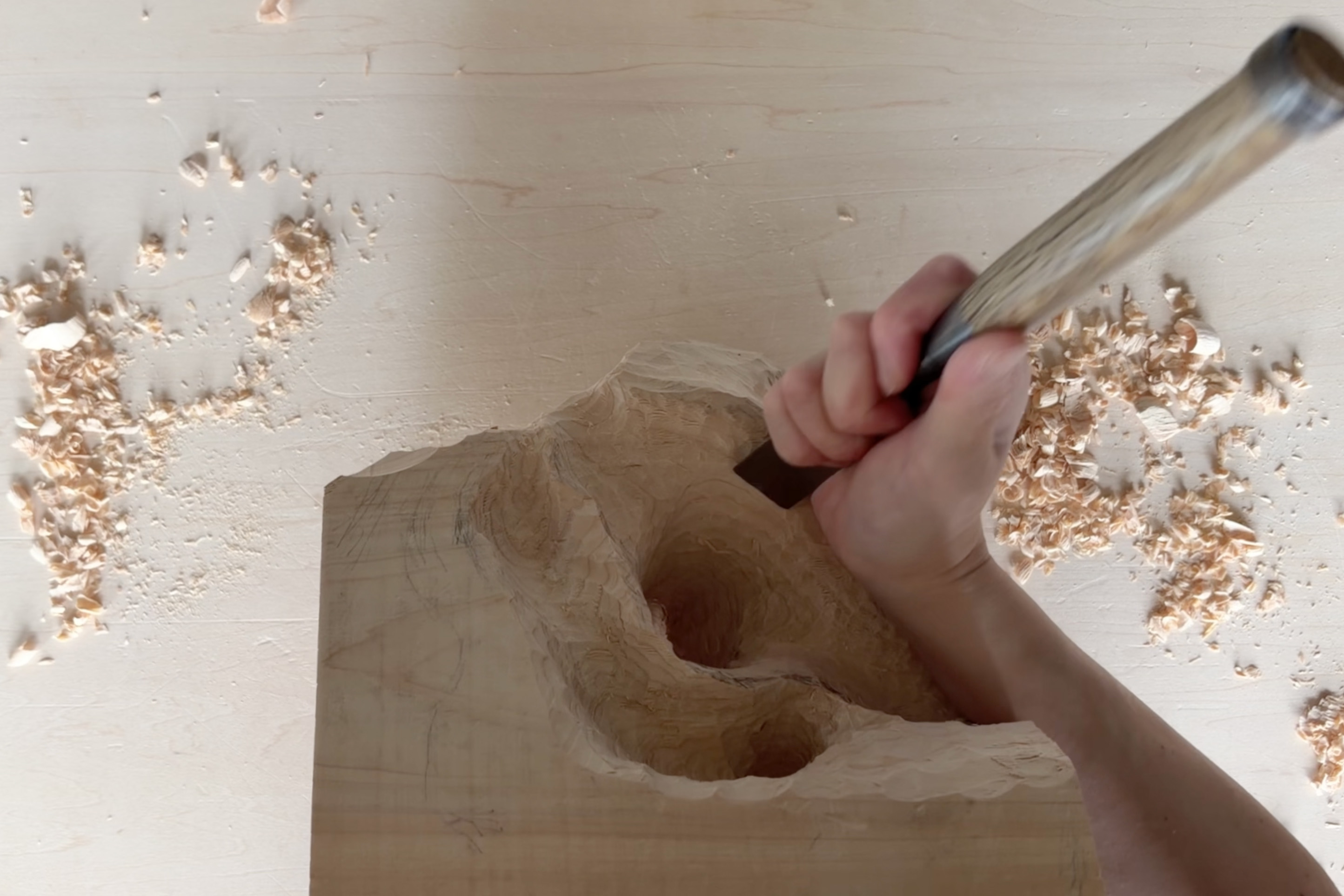Carving at an angle across the straight grain