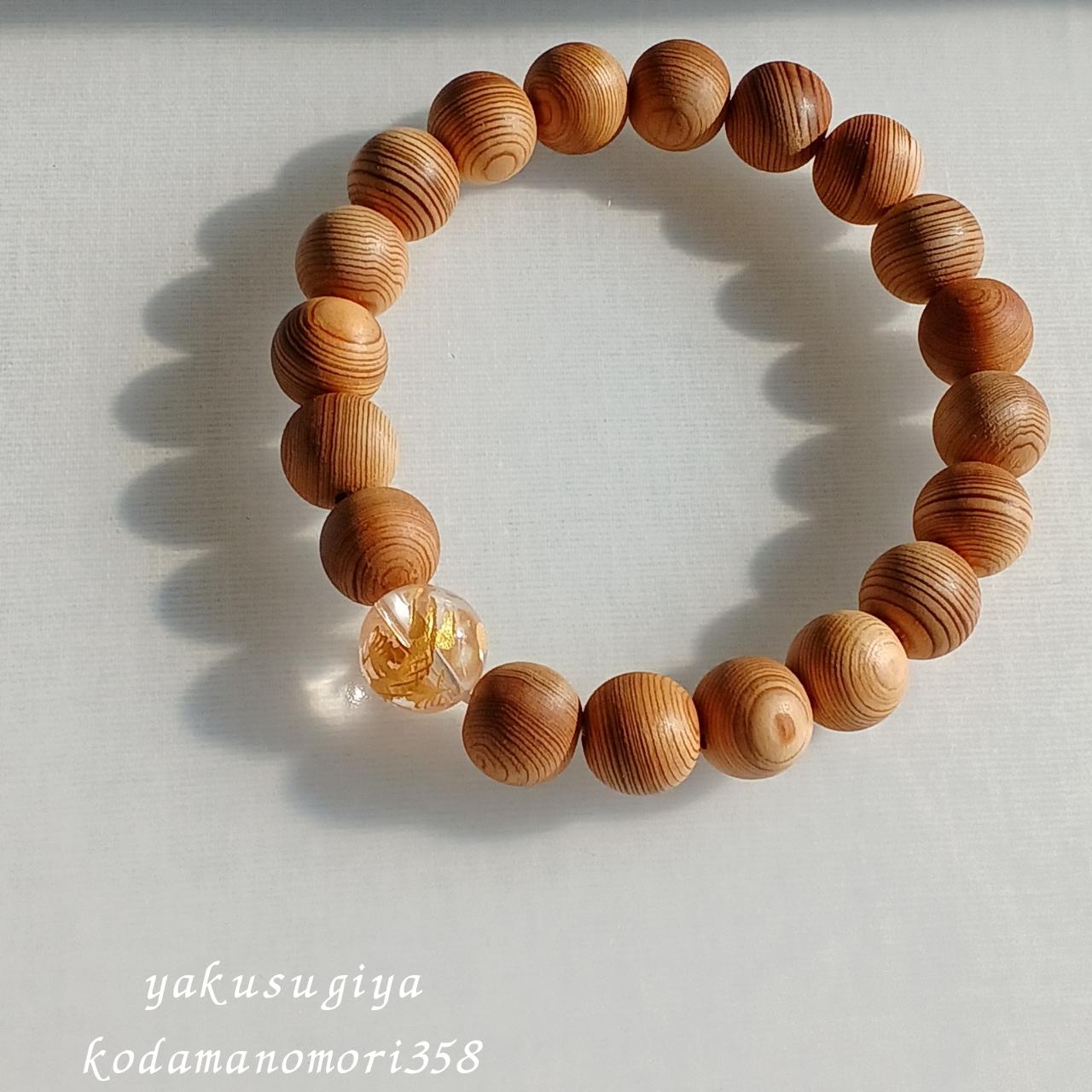 屋久杉と水晶(金龍彫り)のブレスレット
