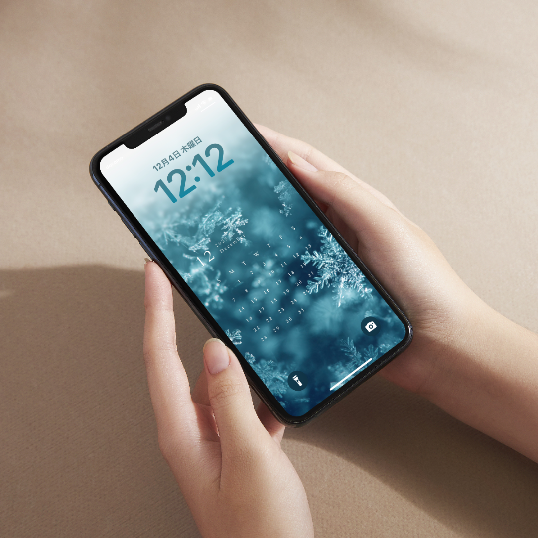 冬のスマホ壁紙 雪の結晶と12月の静かなデザイン