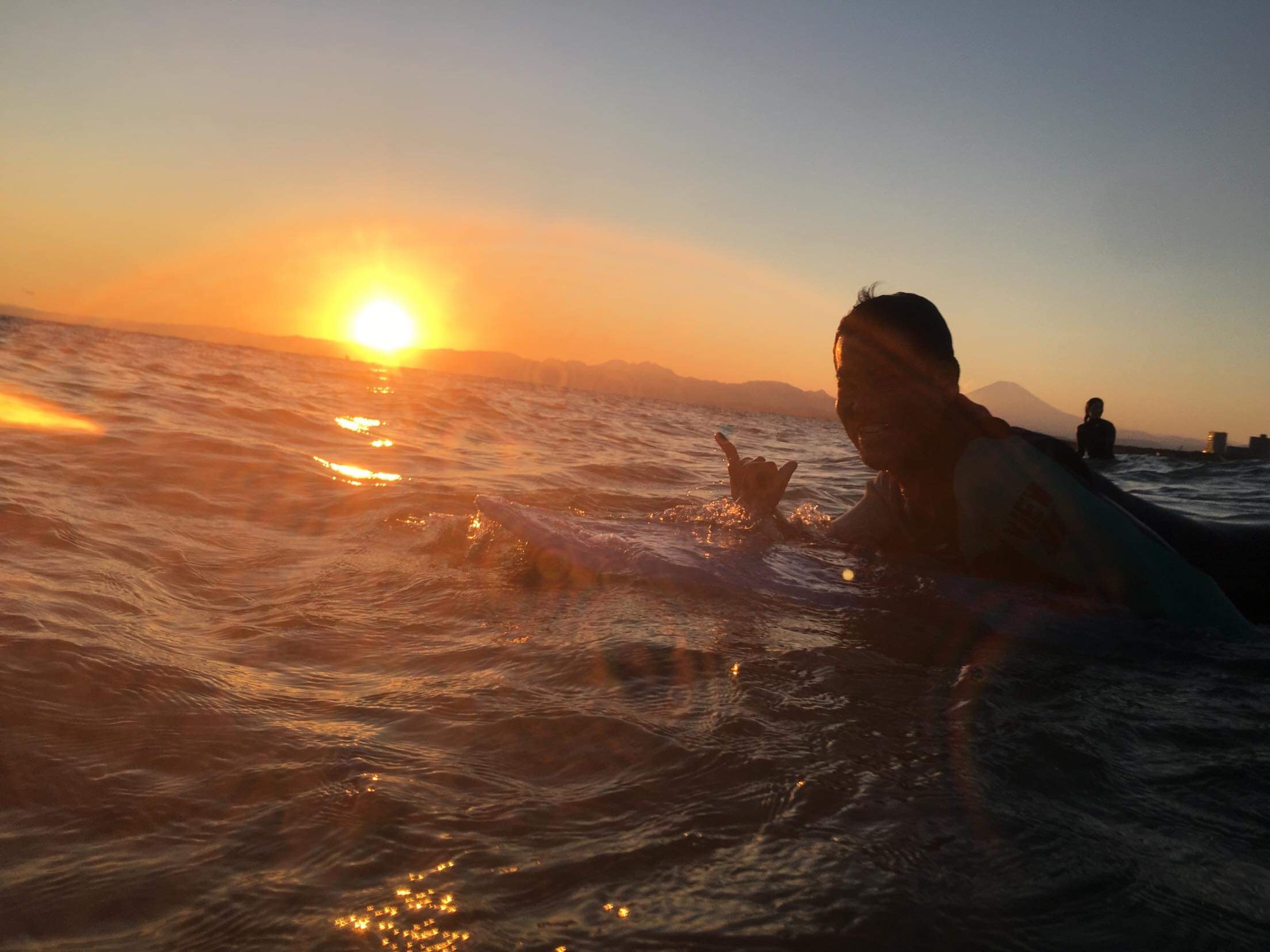sunset surfing