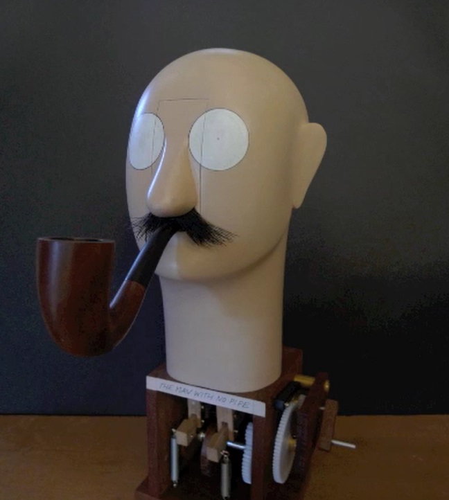 ポール・スプーナーの作品「パイプのない男 / The Man with No Pipe」作品紹介